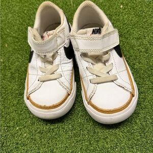 Nike Kids White Sneakers with Black Swoosh and Tan Accent